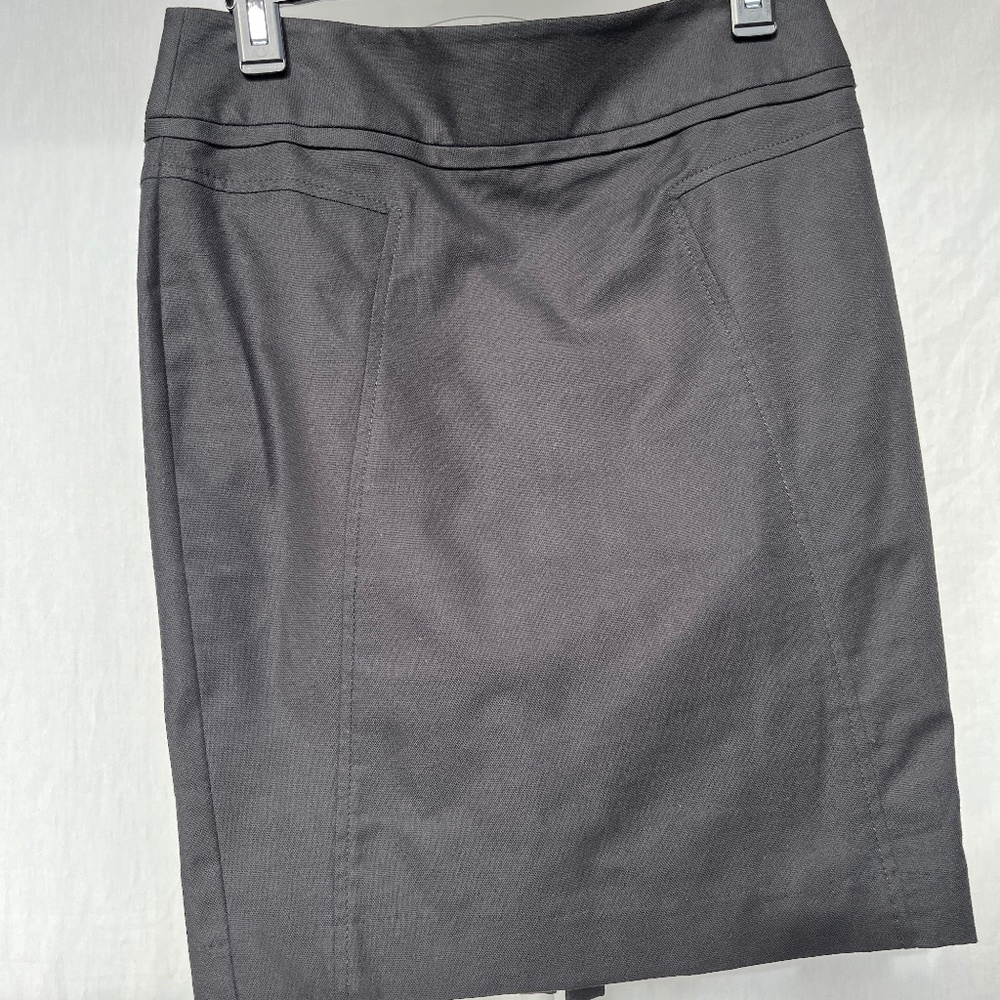 Club Monaco (2) black pencil skirt with double kick pleat.